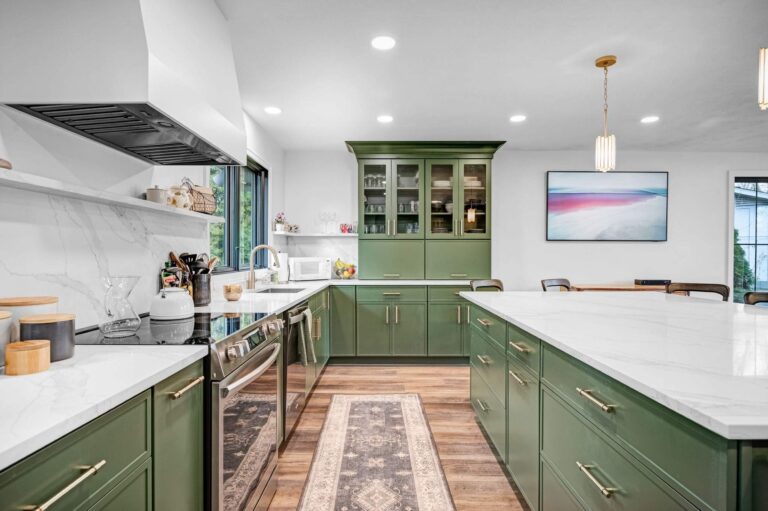 Green cabinet kitchen with marble counters