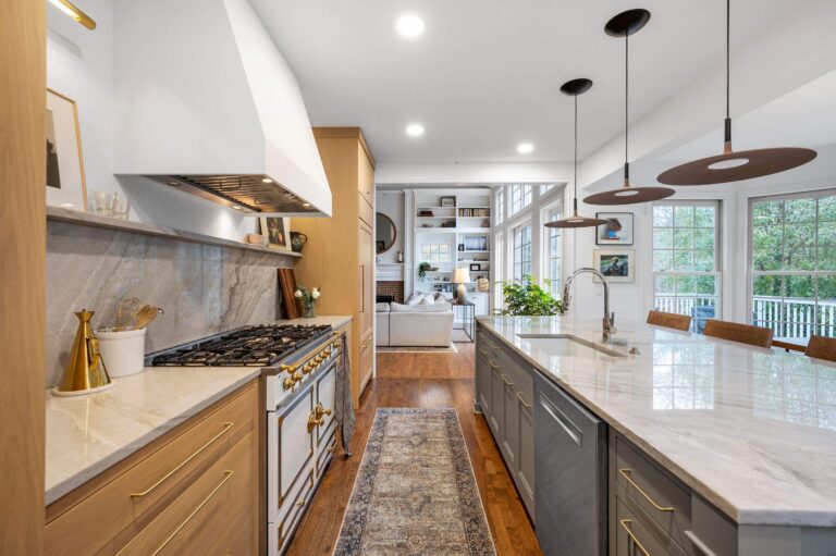 Oak and gray kitchen with a white range and island