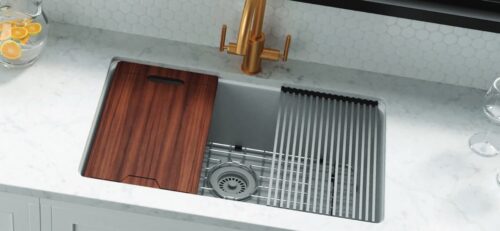 Lexicon LP-1030 quartz workstation sink installed with wood cutting board and rollup drain mat